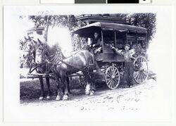 Fruit peddlers with draft horses and covered wagon, St. Paul (4418715023).jpg