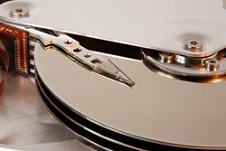 Seagate ST33232A hard disk head and platters detail.jpg