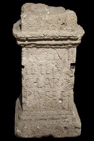 Narrow stone altar, with inscription