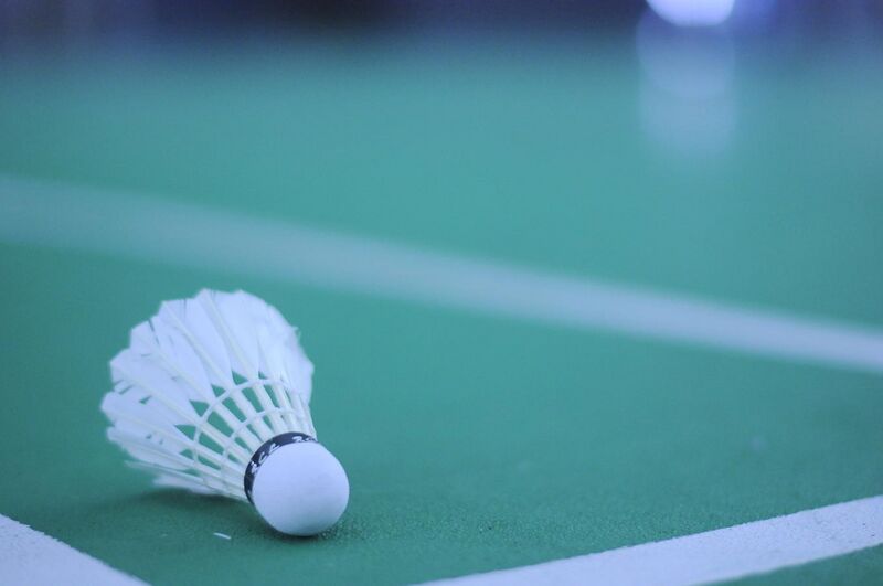 File:Shuttlecock on a badminton court.jpg