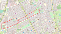 Excerpt from an OpenStreetMap map, zoomed at the Warsaw neighbourhood of Muranów, with the borders of the Warsaw concentration camp outlined. The camp occupied a long and narrow strip of land of a roughly rectangular shape, bordered by Okopowa street to the west, Gliniana, Ostrowska and Wołyńska (now Józefa Lewartowskiego) streets to the north, Zamenhofa street to the east and Gęsia (today's Mordechaja Anielewicza street) to the south.