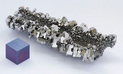 Niobium crystals and 1cm3 cube.jpg