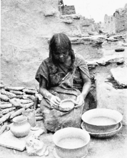 PSM V55 D763 Woman of oraibi making coiled pottery.png