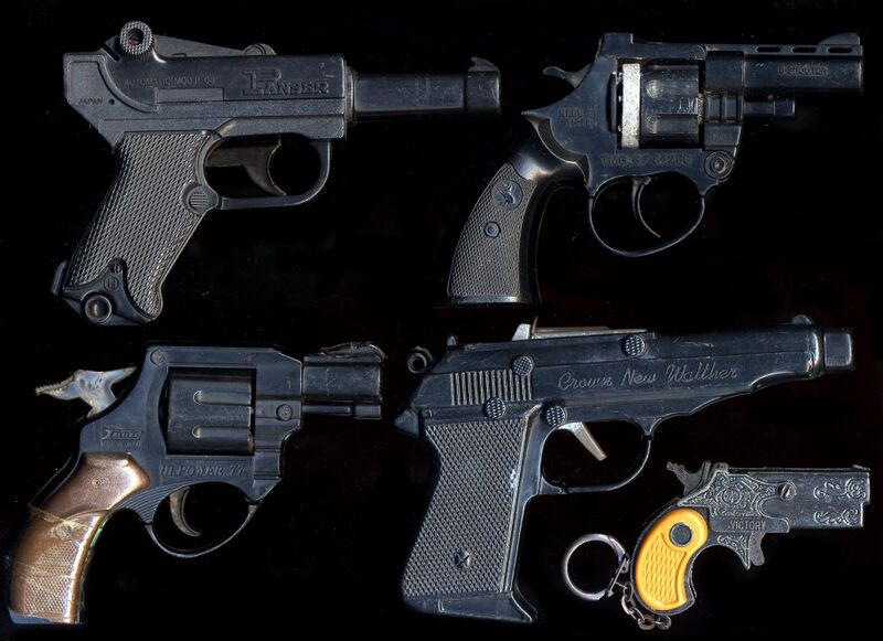 File:Spring operated gun toys.JPG