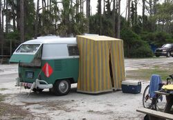 VW bus with attached small tent