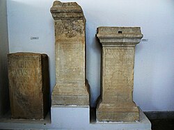 Group of three Roman steles in a museum