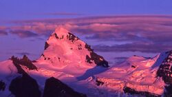 Alpenglow on Mt. Forbes in the Canadian Rockies.jpg