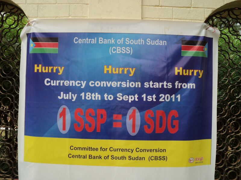 File:Banner in Juba mid July 2011 announcing the conversion from the Sudanese Pound (SDG) to the new currency the South Sudanese Pound (SSP).jpg
