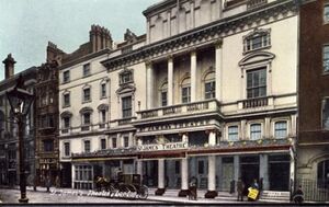 tinted postcard showing exterior of neo-classical building