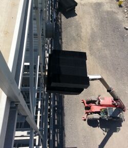 Telescopic handler used for cooling tower construction.jpg