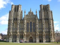 The west front of Wells, unlike Exeter, presents a unified and balanced composition. However, the towers look truncated because they were intended to have spires that were not built.