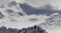 Wildspitze seen from Hinterer Brunnkogel, with visible ascent track of ski mountaineer.jpg