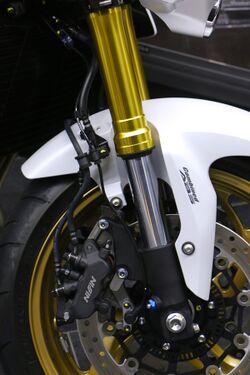 Combined braking system in a motorcycle front wheel.jpg