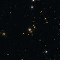 Another lensed quasar, HE0435-1223 in Eridanus, and its surroundings.