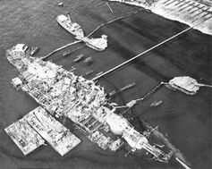 20 September 1943, Oklahoma fully righted, prior to refloating