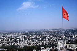 Osh, Kyrgyz flag. Sept 2002 (3507795981).jpg