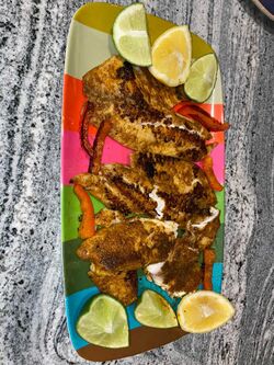 Blackened tilapia with Cajun spices, lemon and lime juice