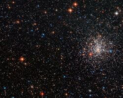 A globular cluster’s striking red eye NGC 2108.jpg