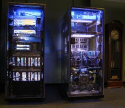 Glowing IBM z13 and clock - cropped.JPG