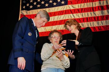 Ms. Nancy Lee Baker, longtime Fairbanks resident, receives a special honor from Sen. Lisa Murkowski and Chief of Staff of the Air Force, Gen. Norton A. Schwartz. Baker, a Women Airforce Service Pilot flew various military aircraft during World War II, her contributions help pave the way for the integration of female pilots into the military.