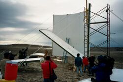 People pulling the panels up to position