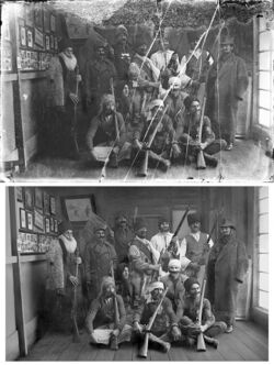Men wearing costumes, digitally restored.jpg