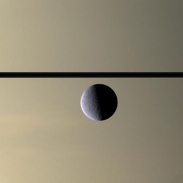 File:Rhea in front of Saturn.jpg
