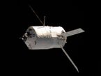 The unmanned ATV-2 Johannes Kepler approaches crewed space station International Space Station.