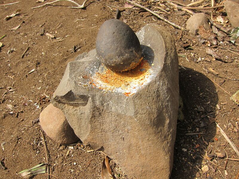 File:Mitmita being made in mortar and pestle.jpg