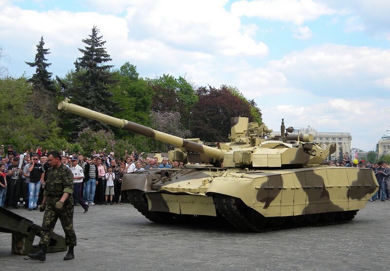 File:T-84 Oplat guided onto a tank transporter.jpg